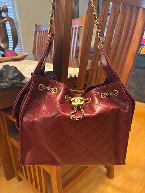 Small 25 quilted leather deep red shoulder bag with gold tone hardware NWOT